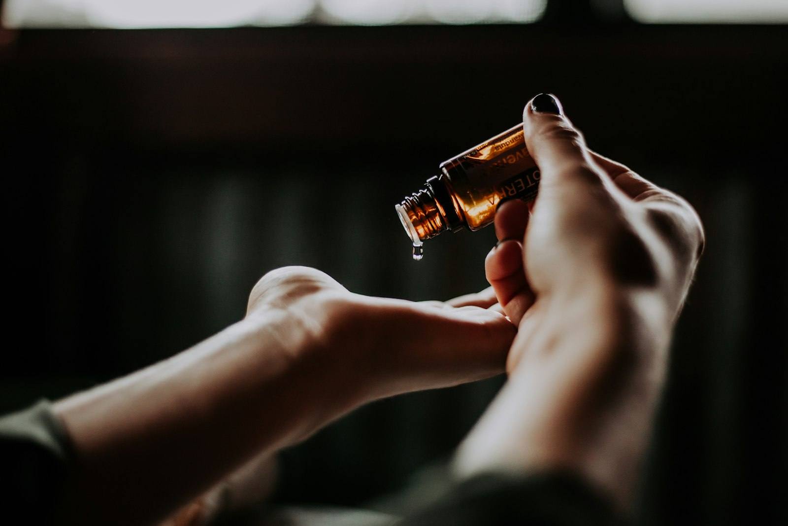 Massage therapist preparing for a treatment session